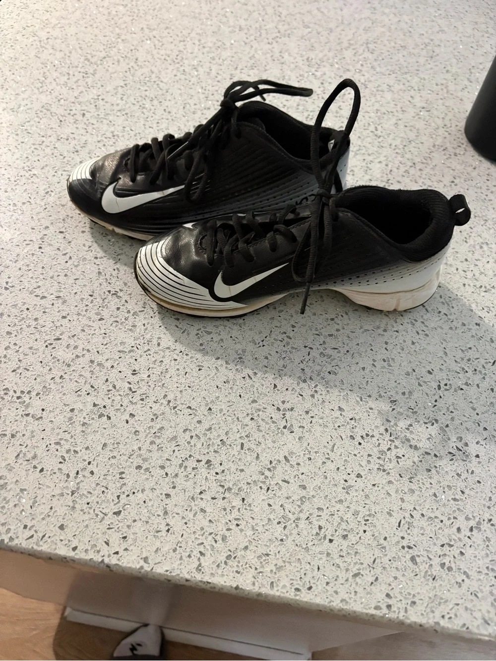 Nike Black and White Soccer Cleats with Swoosh